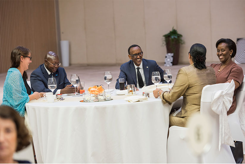 President Kagame and First Lady Jeannette Kagame chat with diplomats during the Diplomatic Luncheon hosted at the Kigali Convention Centre, yesterday. (Village Urugwiro)