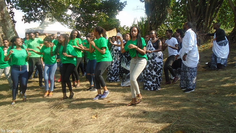 Students learn how to do the traditional Rwandan dance. / Lydia Atieno. 