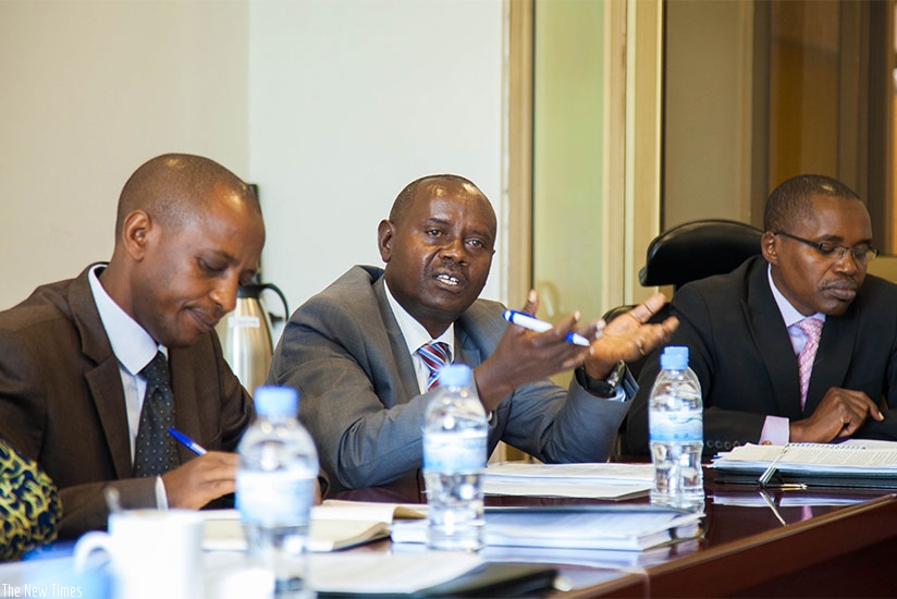 L-R: Bugesera mayor Emmanuel Nsanzumuhire; the district's legal advisor and notary, Martin Rwisumbura, and the Spokesperson of the Ministry of Local Government, Ladislas Ngendahima....