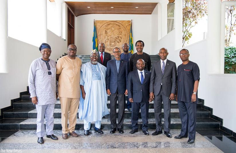 President Kagame in a group photo with a Nigerian delegation at Village Urugwiroyesterday. The delegation included Adebayo Abdul-Raheem Shittu, Nigerian minister of Communications;....