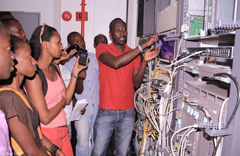 Robert Muratirwa, an Airtel network manager explains to university students how the telecom firmu2019s operation centre works. Such skills are vital and boost oneu2019s employability. / File.