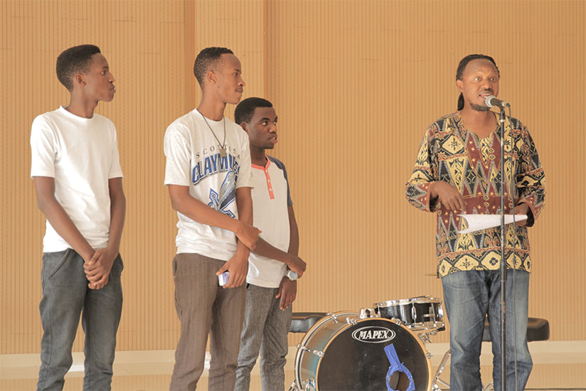 Jacques Murigande, the Director of Nyundo School of music, announces the contestants selected to join Nyundo music school. / Eddie Nsabimana.