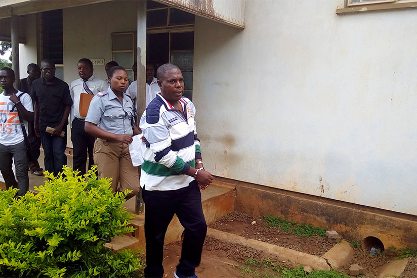 Genocide suspect Vincent Murekezi leaves a court in Malawi during a previous appearance. / File