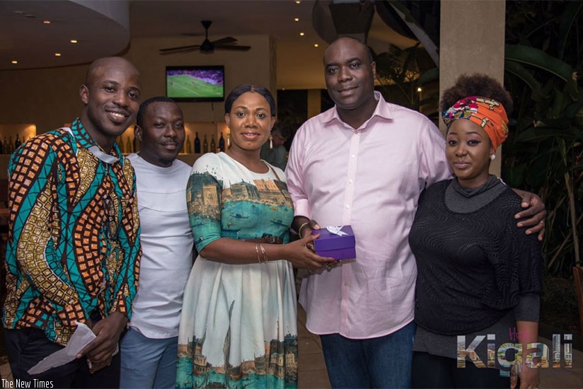 Some of the Ghanaians pose for a group photo in Kigali. The group toured government offices and private firms. / Courtesy.