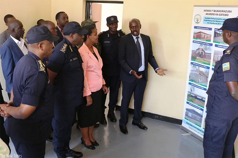 The Mayor of Gatsibo, Richard Gasana, presents the architectural design of the 10 constructed police stations. Courtesy.