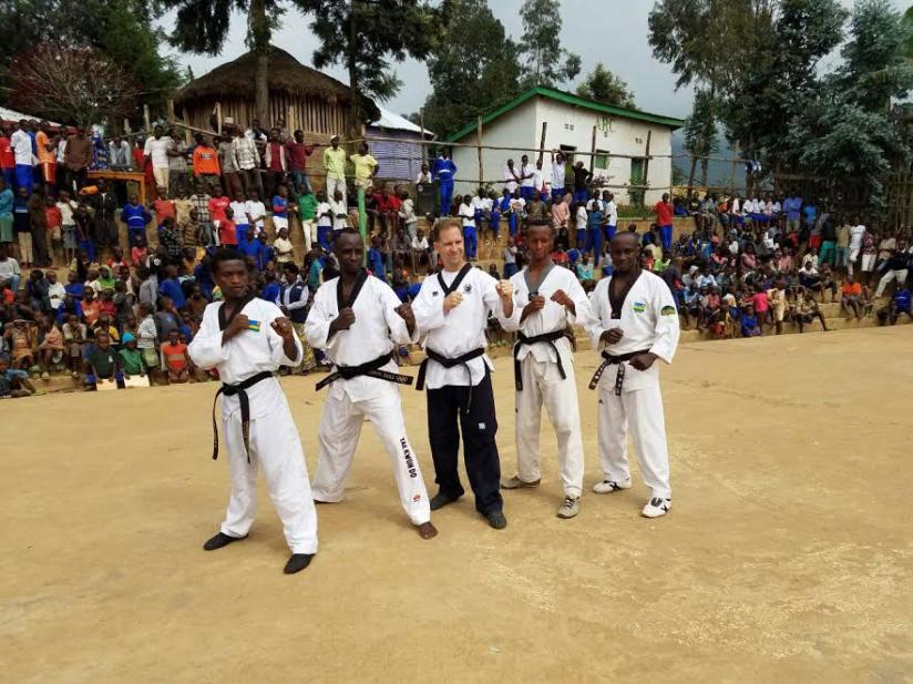 Officials of Rwanda Taekwondo Federation demostrating for refugees in Kiziba Camp. / Courtesy