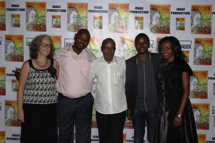 Bitamba poses with the crew behind Ishyaka's production during the premiere.