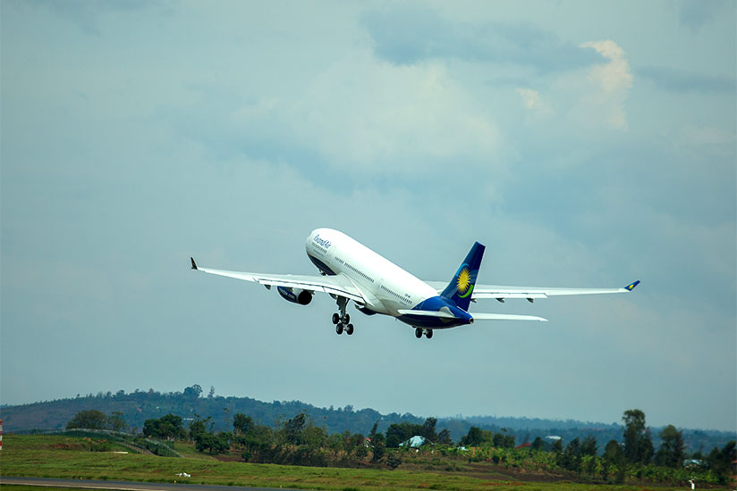 A RwandAir plane after takeoff at Kigali International Airport. The airline has opened another channel for travellers to book and pay for flights online. / File