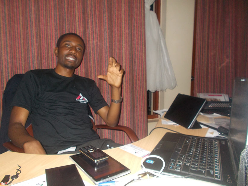 Seth Nshimiyimana, a representative of graduates of estate management and valuation during the interview at his office in Kigali. Elias Hakizimana.