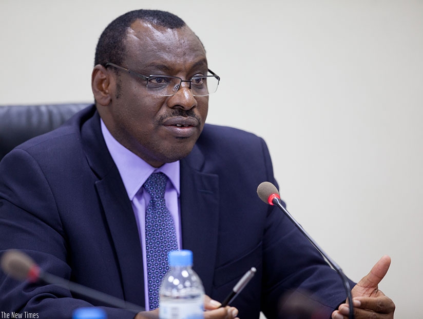 Amb. Gatete addresses Parliament on the Governmentu2019s sale of stakes in I&M Bank. Timothy Kisambira.