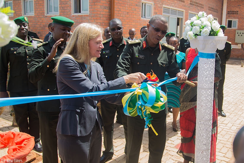 US Ambassador to Rwanda Erica Barks-Ruggles and the Commandant of the Rwanda Military Hospital Brig Gen Dr Emmanuel Ndahiro cut the ribbon to officially open the centre yesterday. ....