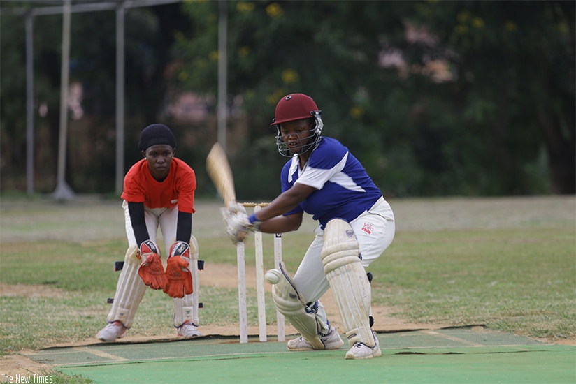 Oasis Cricket Club's Rachael Ntono contributed 18 runs in 21 balls against White Clouds  on Saturday at Kicukiro ground. (S. Ngendahimana)
