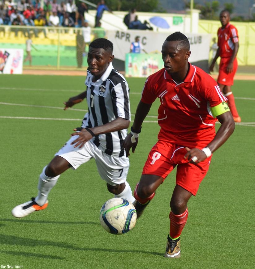 Etincelles FC striker Salita Gentil Kambale takes on APR FC midifielder Janvier Benedata in a previous game at Kigali Regional Stadium. Sam Ngendahimana.