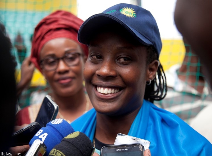 Uwamahoro smiles after setting the new record (Photos by Sam Ngendahimana)