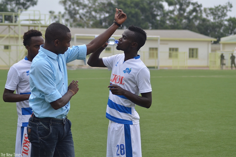 Masudi gives instructions to his players on the touchline during a recent league game at Nyamirabo regional stadium. (Sam Ngendahimana)