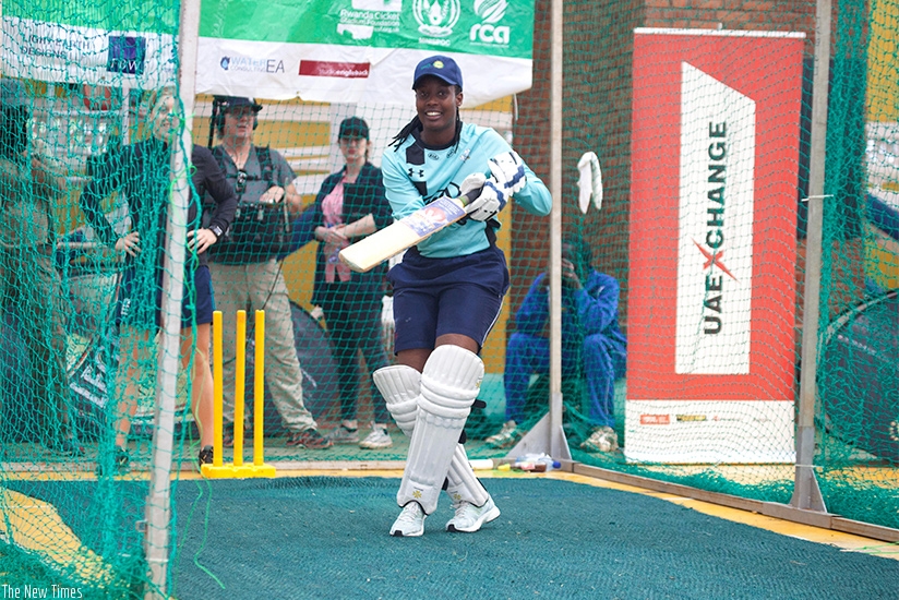 Uwamahoro in action before breaking the 26 hour long record of batting in the net. (Photos by Sam Ngendahimana)