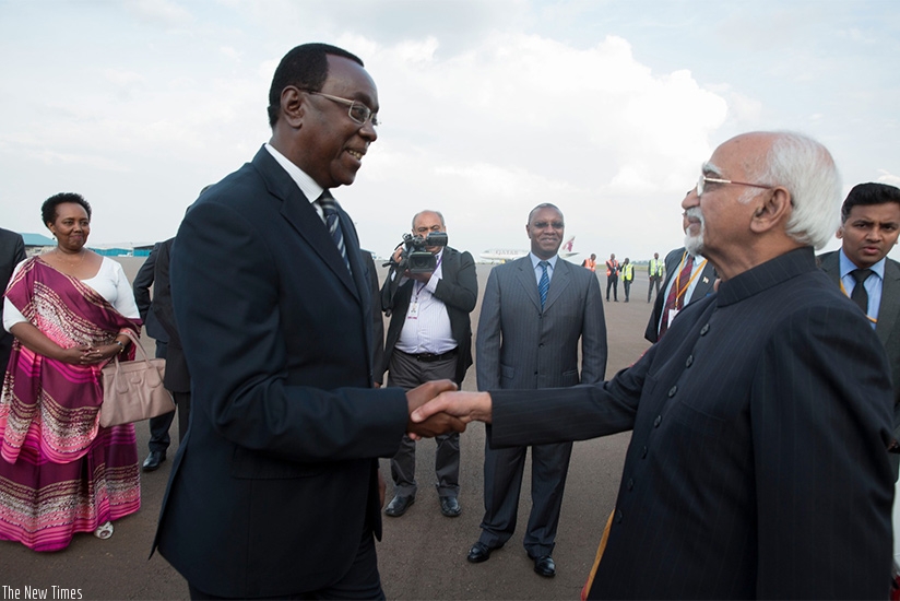 Makuza receives Ansari at Kigali International Airport yesterday. (Courtesy photos)