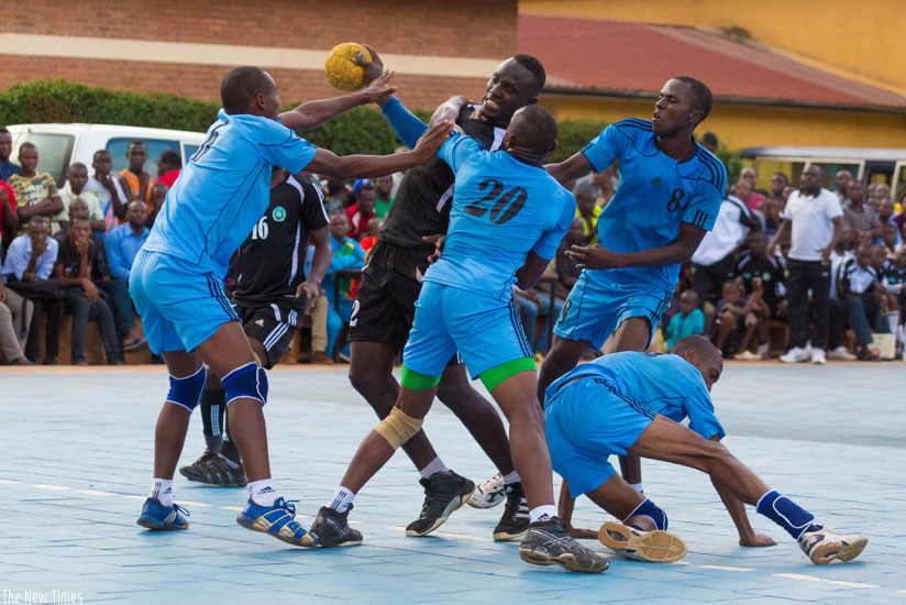 Reigning league champions Police (blue) defeated APR 40-38 to extend lead on top of the league table (File)