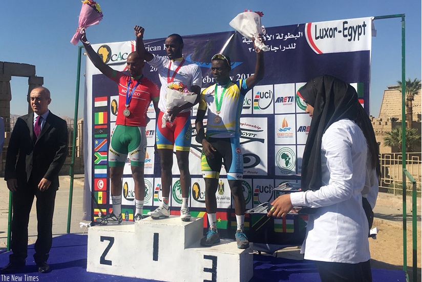 Joseph Areruya (right) celebrates his third bronze medal yesterday in Luxor, Egypt. (Courtesy)