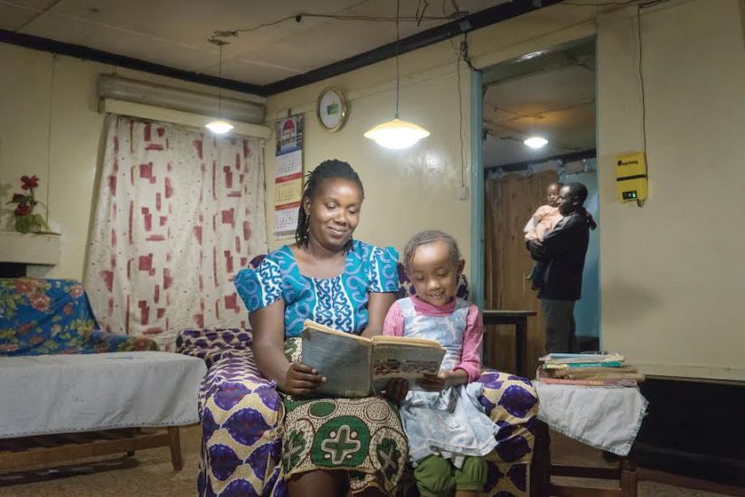 A family that now uses Ignite Power Home System instead of kerosene to light their house