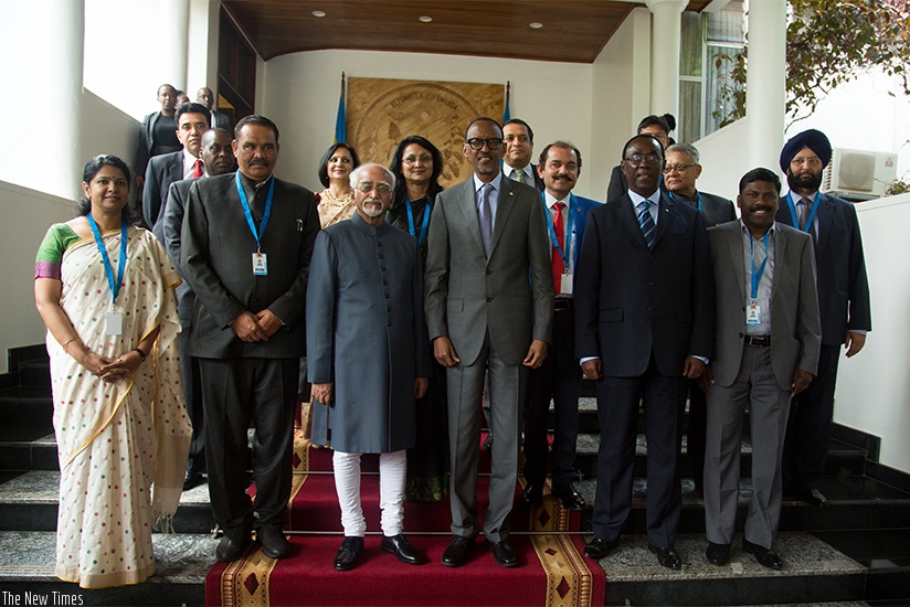 President Kagame and the delegation of Indian government and private sector officials led by VP Ansari (3rdL) in a group photo at Village Urugwiro yesterday. rn