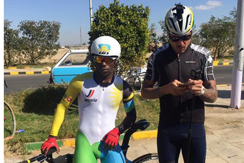 Joseph Areruya poses with Team Rwanda head coach Sterling Magnell in Egypt. Coutesy