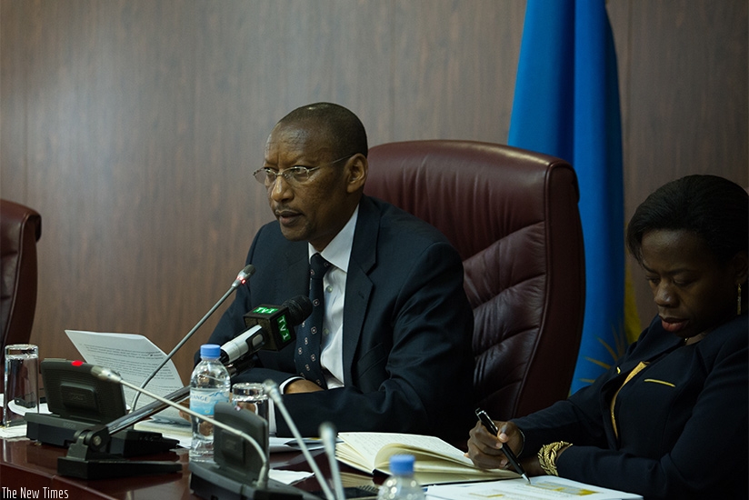 Central bank governor John Rwangombwa (L) and his deputy Dr Monique Nsanzabaganwa brief the media in Kigali yesterday. (Photos by Timothy Kisambira) 