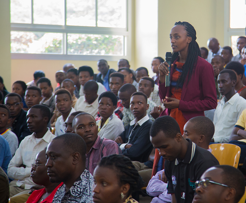 Fourth year student at sciences and tech faculty college, Raissa Mugisha asks the Indian vice president a question yesterday. Faustin Niyigena