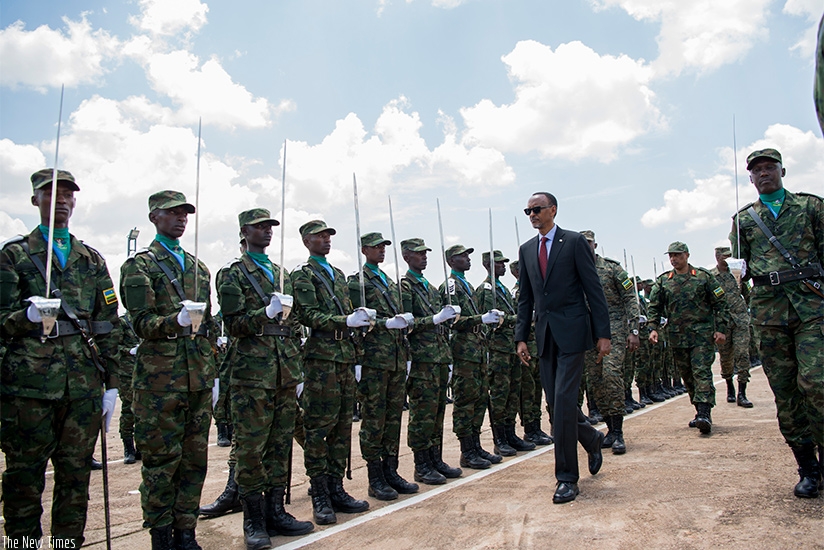 President Kagame inspects a guard of honour at the graduation ceremony of officer cadets at Rwanda Military Academy in Gako, in Bugesera District yesterday. The Head of State urged....