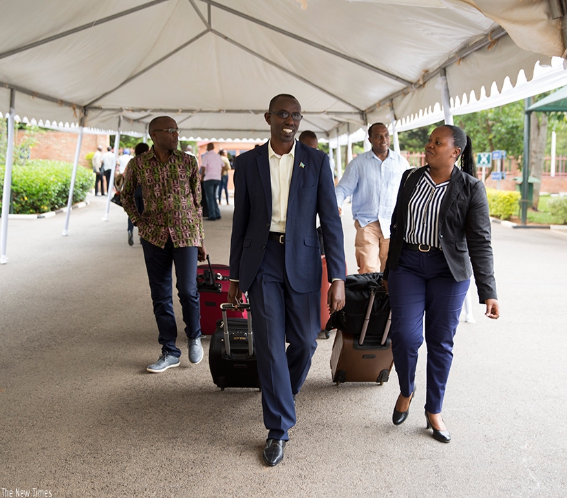 Some of the officials set off to board buses en route to Gabiro for the Leadership Retreat yesterday. Top leaders from the central and local governments, and members of the private....
