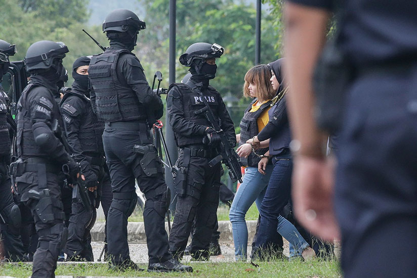 Doan Thi Huong, 28, of Vietnam was charged with murder on Wednesday in Malaysia in connection with the assassination of Kim Jong-nam, the half brother of North Korea's leader, Kim ....
