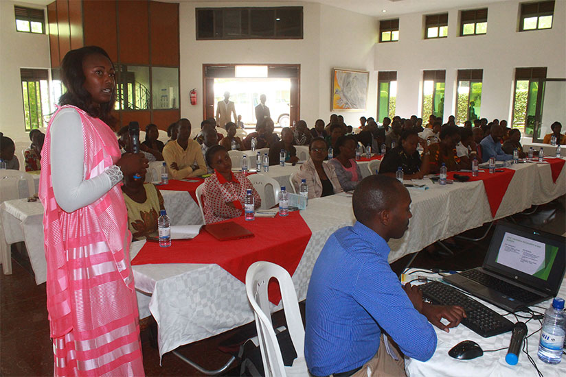 TUGUMANE project coordinator Jacqueline Ntagisanimana addresses participants during the workshop. / A. Iradukunda