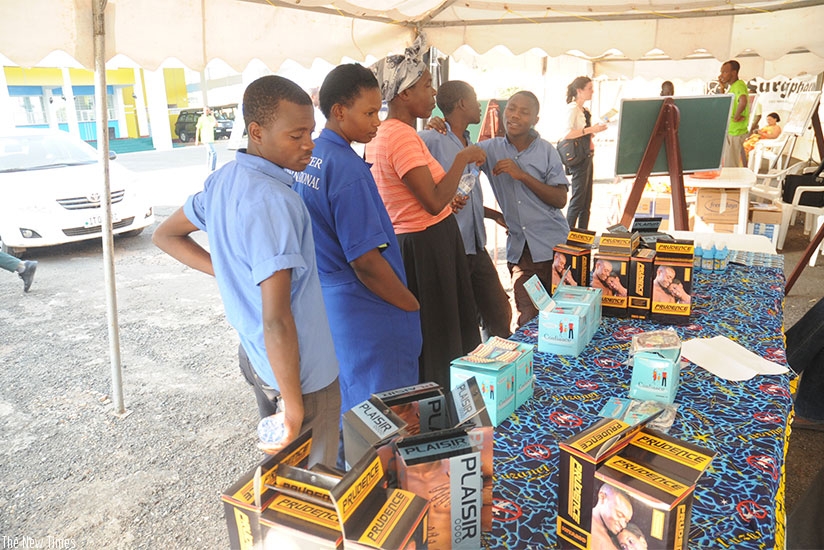 People inquire about different forms of contraception during a past event on reproductive health. File. 