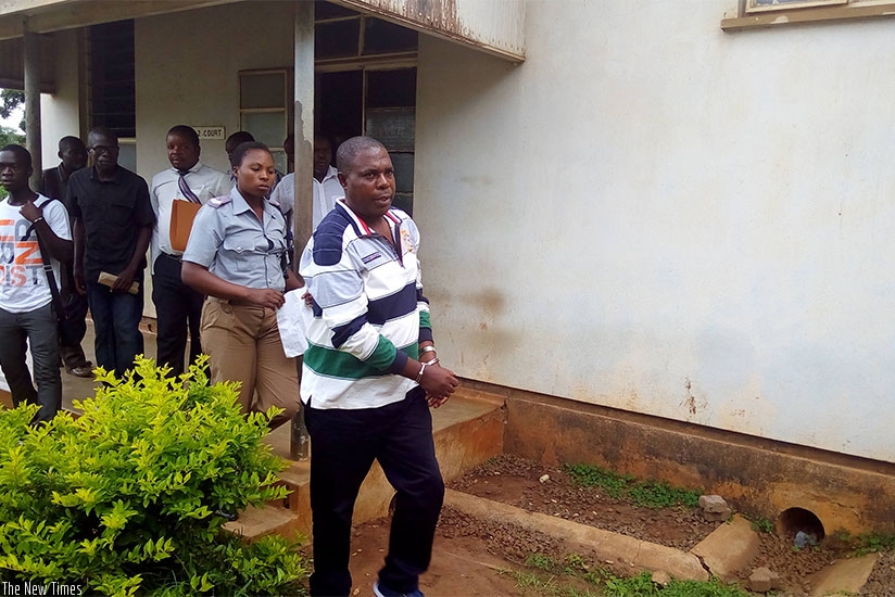 Genocide suspect Vincent Murekezi leaves a court in Malawi during a previous appearance. / File
