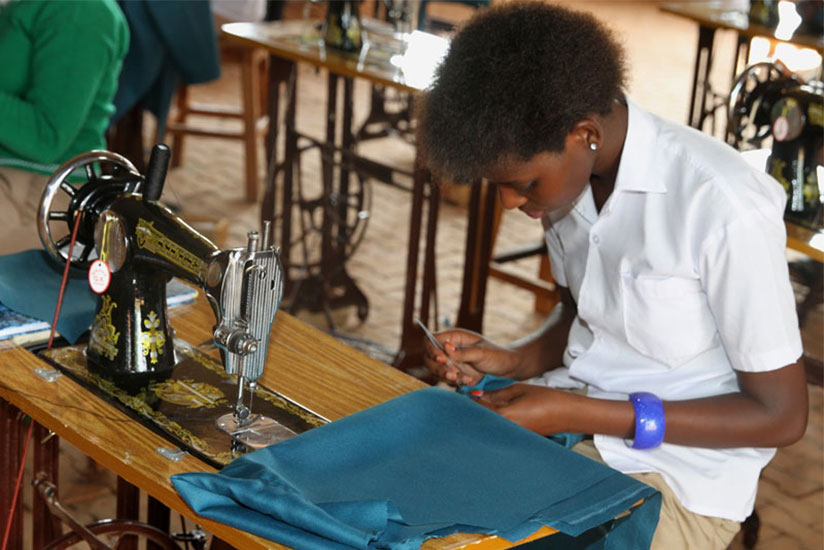 A student learns tailoring. Learning a new skill in the vacation will make you more competitive on the job market. / File