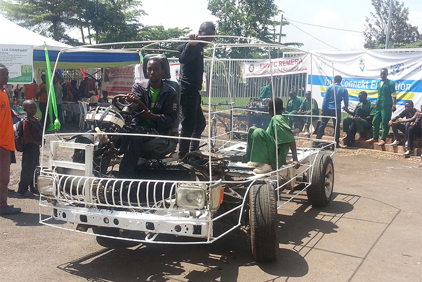 Eric Hakizimana test-drives one of the prototype cars assembled by EMVTC students. / Elisee Mpirwa
