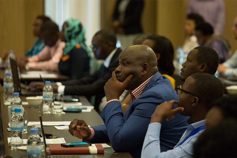 Participants at the launch of the report in Kigali last week. / Timothy Kisambira