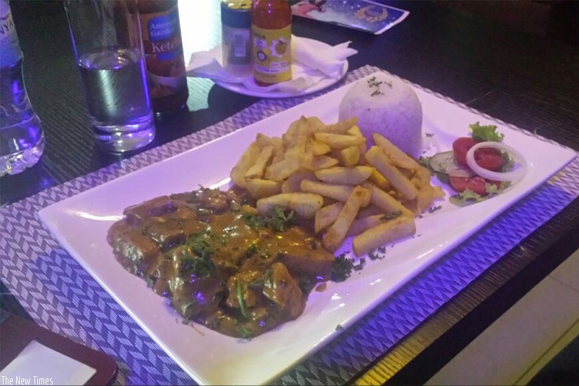 Chicken curry served with fries at The Junction. Photo by Michael Bageine.