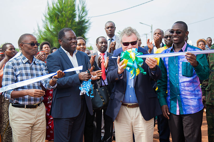 Fulgence Nsengiyumva, the State Minister for Agriculture (2ndL); Michael Ryan, the head of the EU Delegation to Rwanda (2nd R); and the Mayor of Rulindo District, Emmanuel Kayirang....