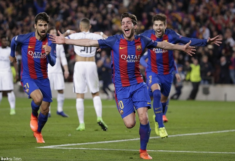 Roberto is chased by team-mates Andre Gomes and Gerard Pique as they rejoice in a miracle win at the Nou Camp. Net photo