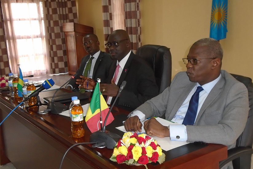 L-R: Busingye addresses the media on Thursday. Looking on are his Malian's counterpart Mamadou (R) and Evode Uwizeyimana, the State Minister for Legal and Constitutional Affairs. /....