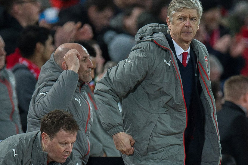 Arsenal boss Arsene Wenger shows his displeasure after watching his side go 2-0 down in the first-half at Anfield. / Internet photo