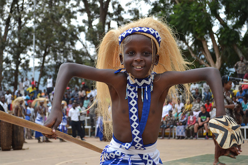 A young Intore dancer in Kigali City traditional troupe Indatirwabahizi.