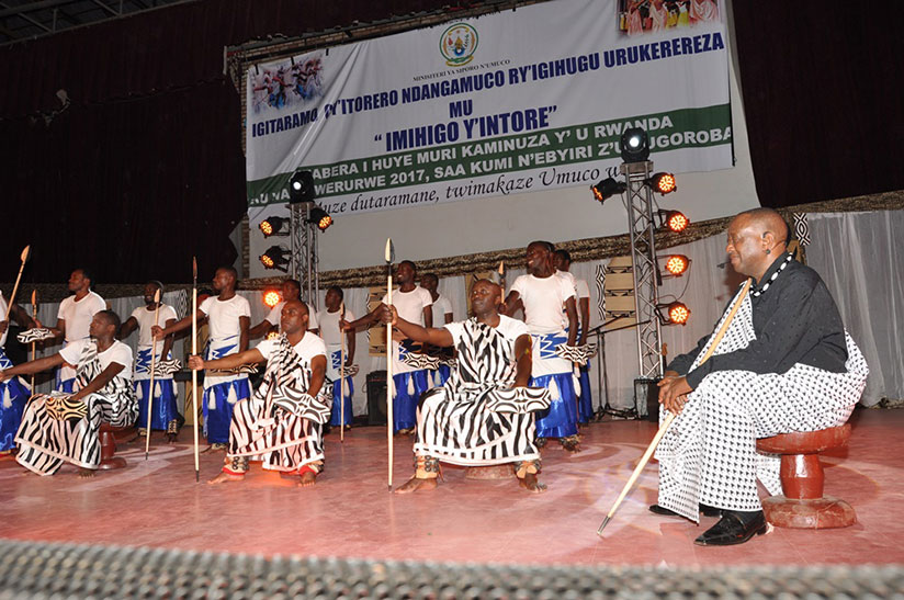 The traditional artist Muyango with the National Ballet Urukerereza's Intore performing how ancient Rwandans used to pledge (Guhiga). Remy Niyingize.