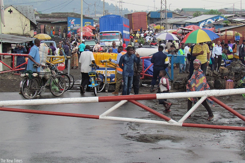 Rwandan traders going to the market in DRC. Cross-border traders say they face many problems. / Donata Kiiza.  
