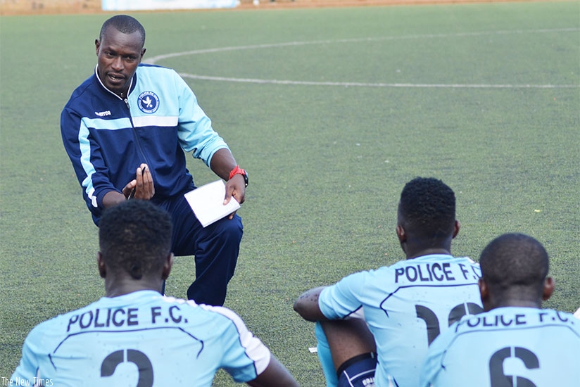 Police head coach Innocent Seninga gives instructions to his players during a recent league match. Sam Ngendahimana.