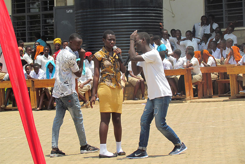 Students of GS Remera Protestant School perform the play about evils of unwanted pregnancies among the teenage students. / Francis Byaruhanga