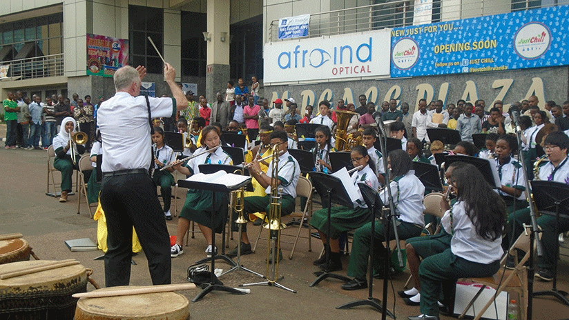 Lance Gaskill instructs the band during the performance. /Sharon Kantengwarn