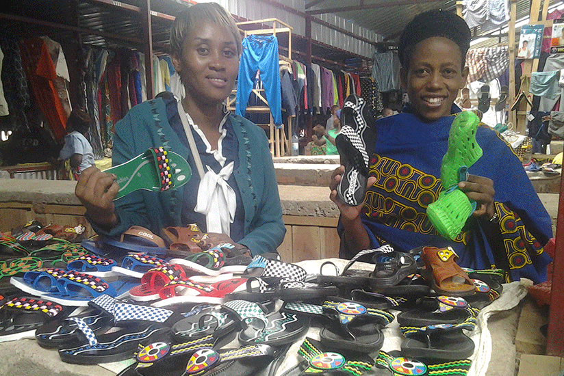 Vendors at the Kisementi market. Tired of the hustle and running battles with law enforcement agents, they say stalls have brought relief. Ange Violette Iradukunda.rn