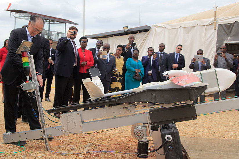 World Bank Group president Jim Yong Kim launches a medical supply delivery drone at Zipline Drone Project in Muhanga District yesterday. Kim, who is in the country on a two-day vis....